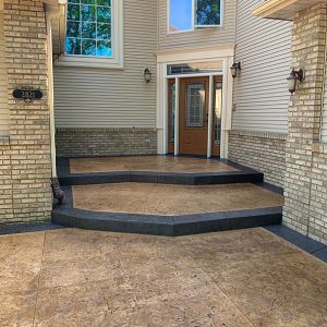 Front Entrance with Decorative Concrete Apron/Drive