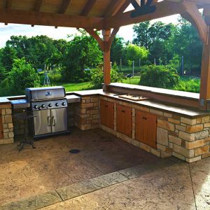 Outdoor Kitchen Colored Stamped Concrete Slate Texture Patio Surround and Concrete Countertops